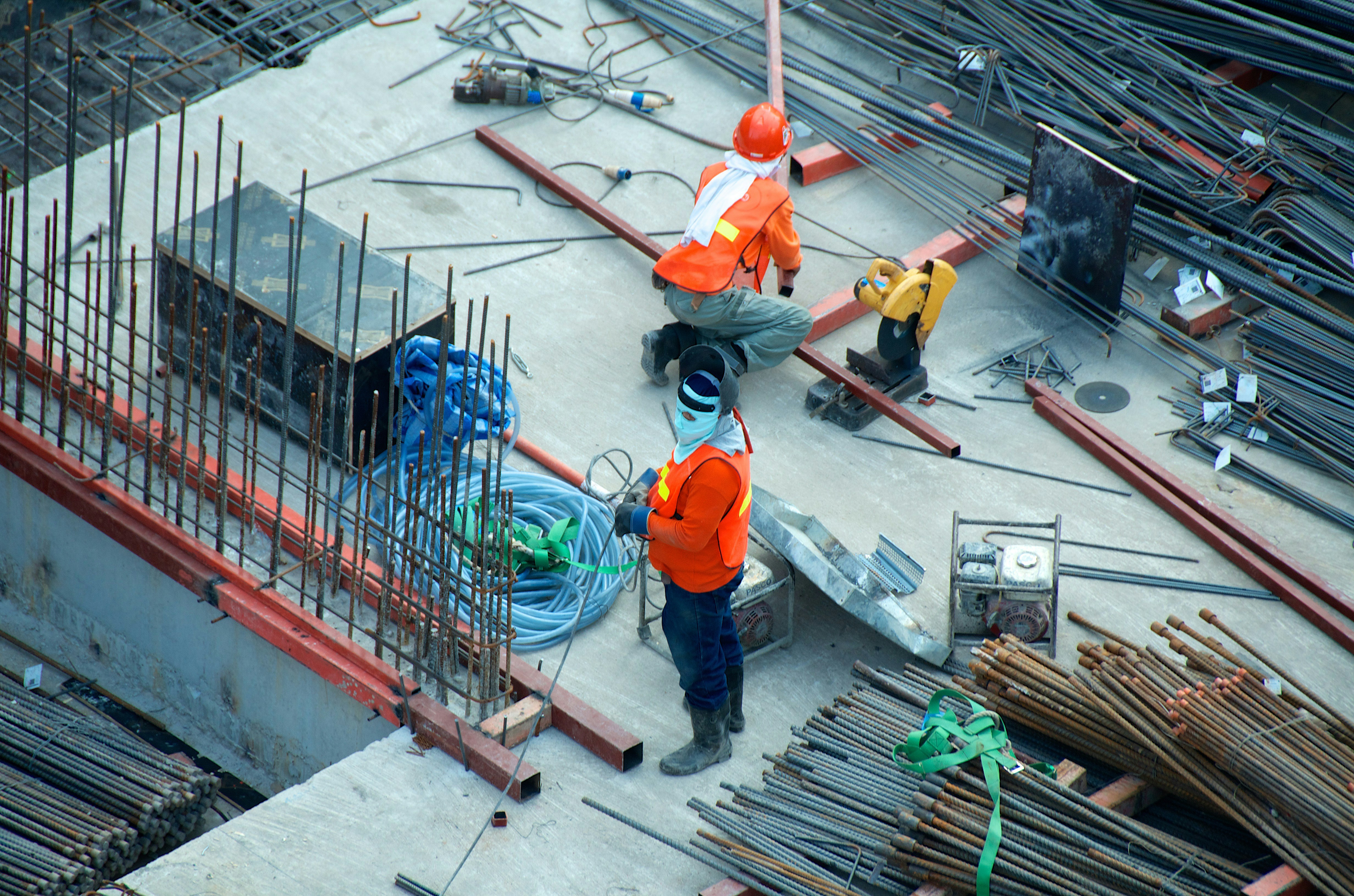 Construction Services - workers and rebar on site